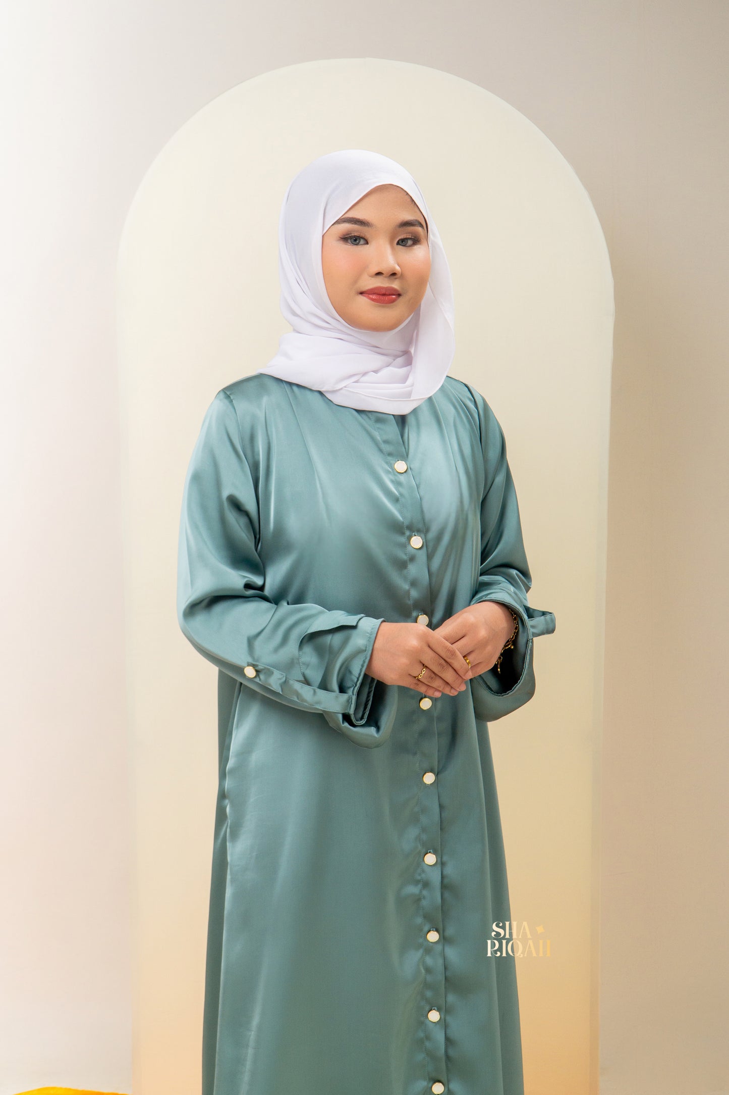 Qaaira Cardibaya in Cyan