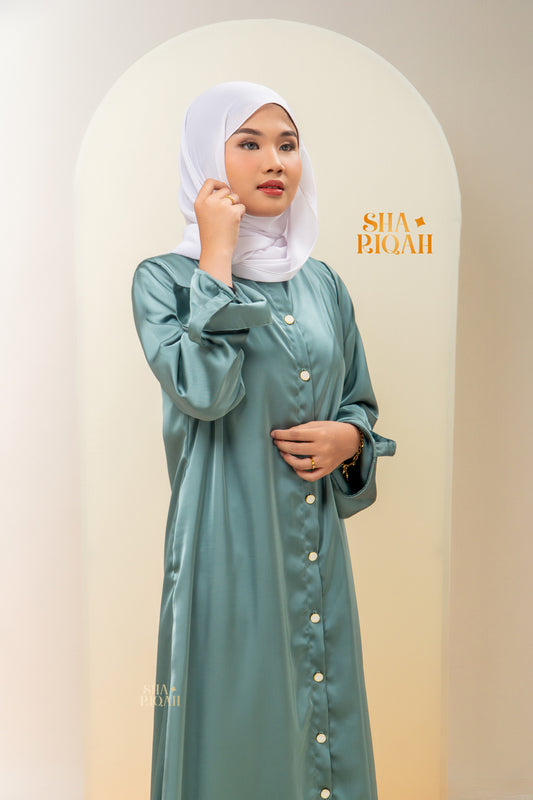 Qaaira Cardibaya in Cyan
