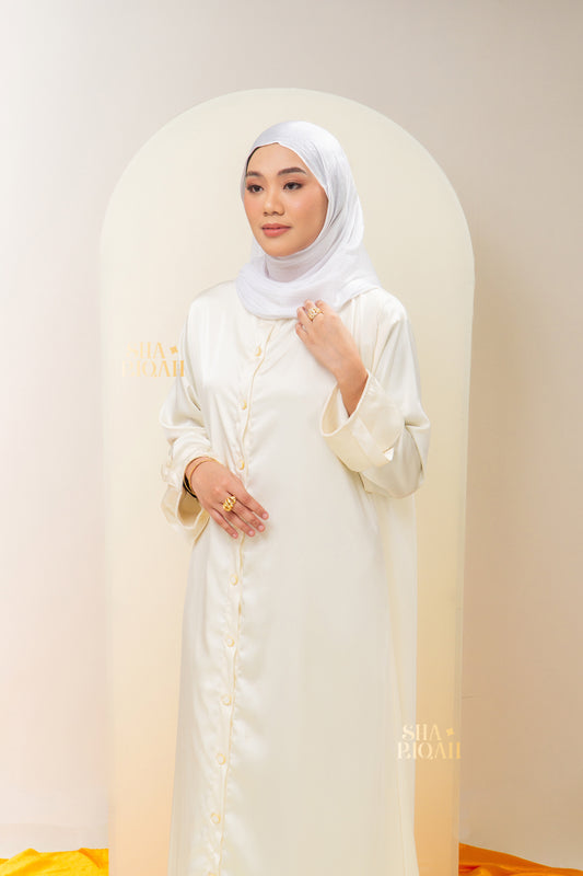 Qaaira Cardibaya in Cream White